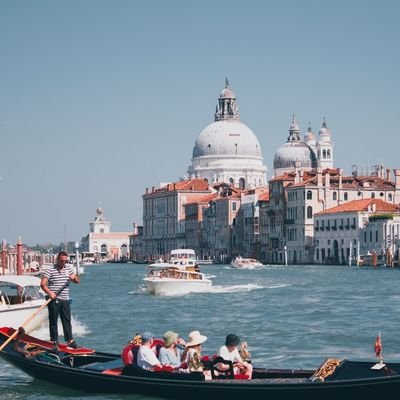 Group boat tour in a historic city